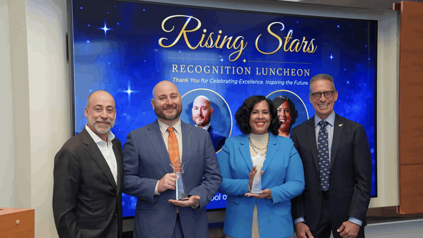 Chad Lefteris, with Rising Stars awardees Ryan Gibney, MD, and Crystal M. Glover, PhD; and Michael J. Stamos, dean of the School of Medicine at the Rising Stars Lunch.