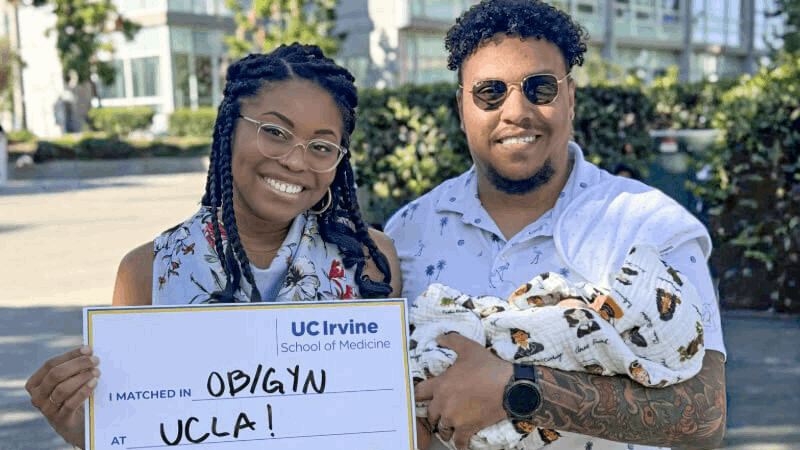 Avery Robinson-Phelps, MD, with her husband and baby at Match Day